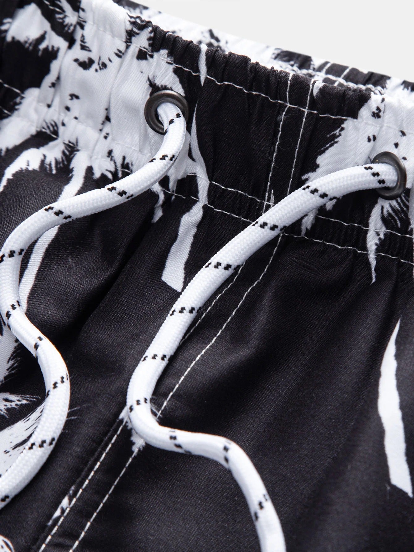 Pantalones cortos de natación con estampado de palmera
