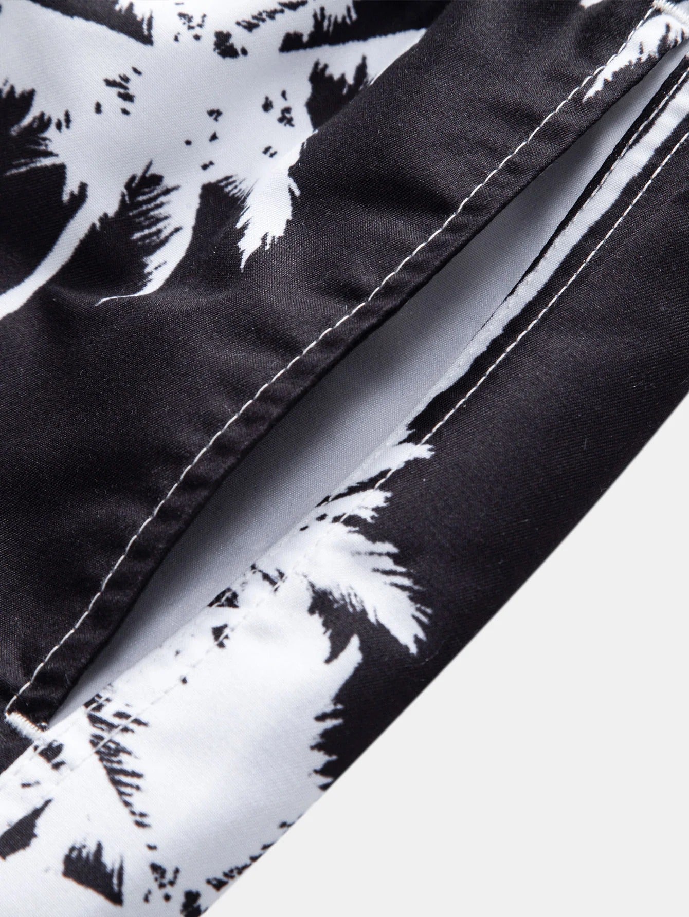Pantalones cortos de natación con estampado de palmera